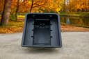 ATVCB ATV trailer black plastic tub interior close-up showing dump pivot bracket and bed