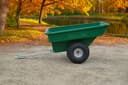ATVCG ATV trailer green plastic tub, single rear wheel, full left side view with tow hitch