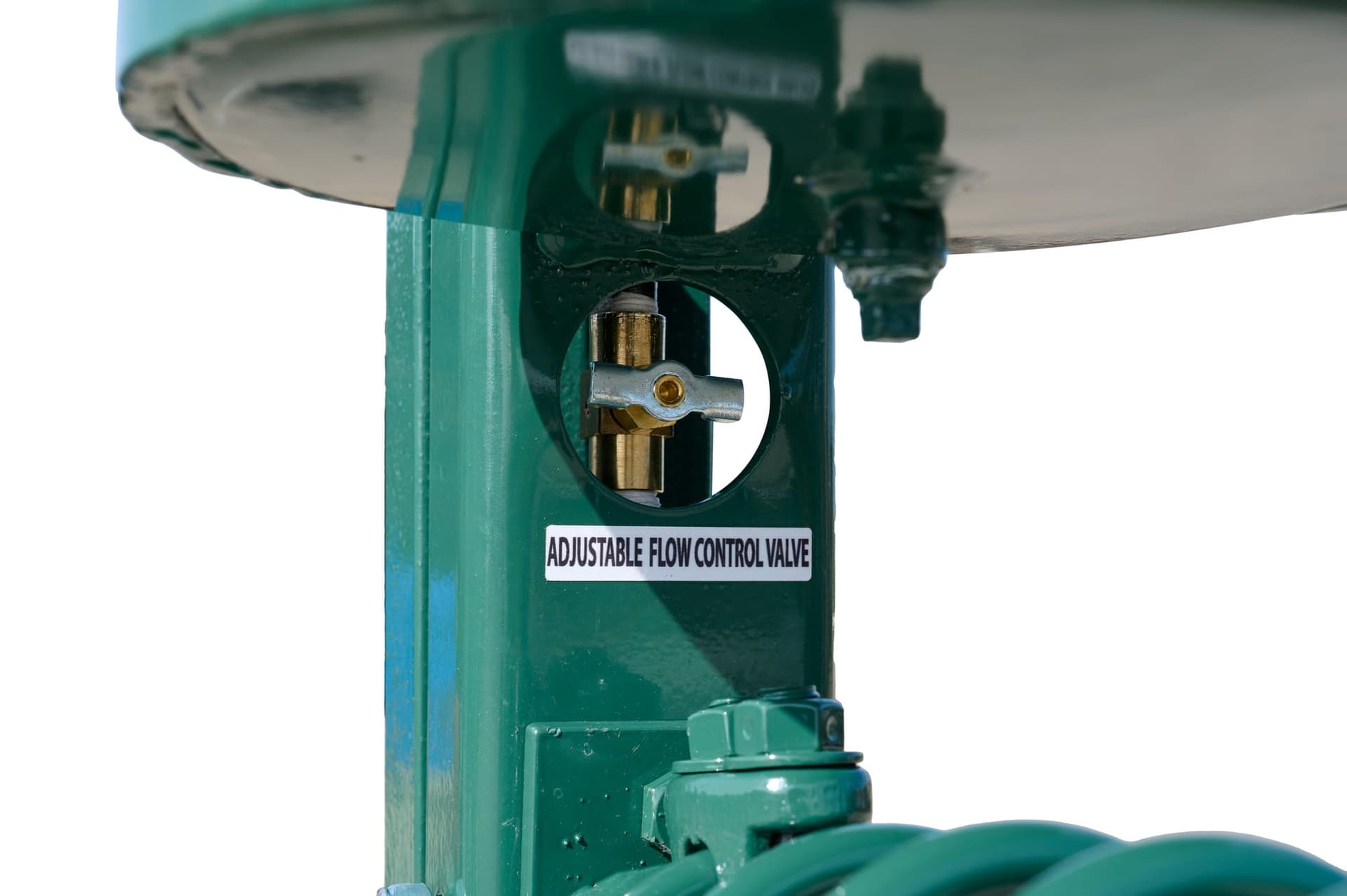 D-91 cattle oiler close-up of green post with adjustable brass flow control valve and label
