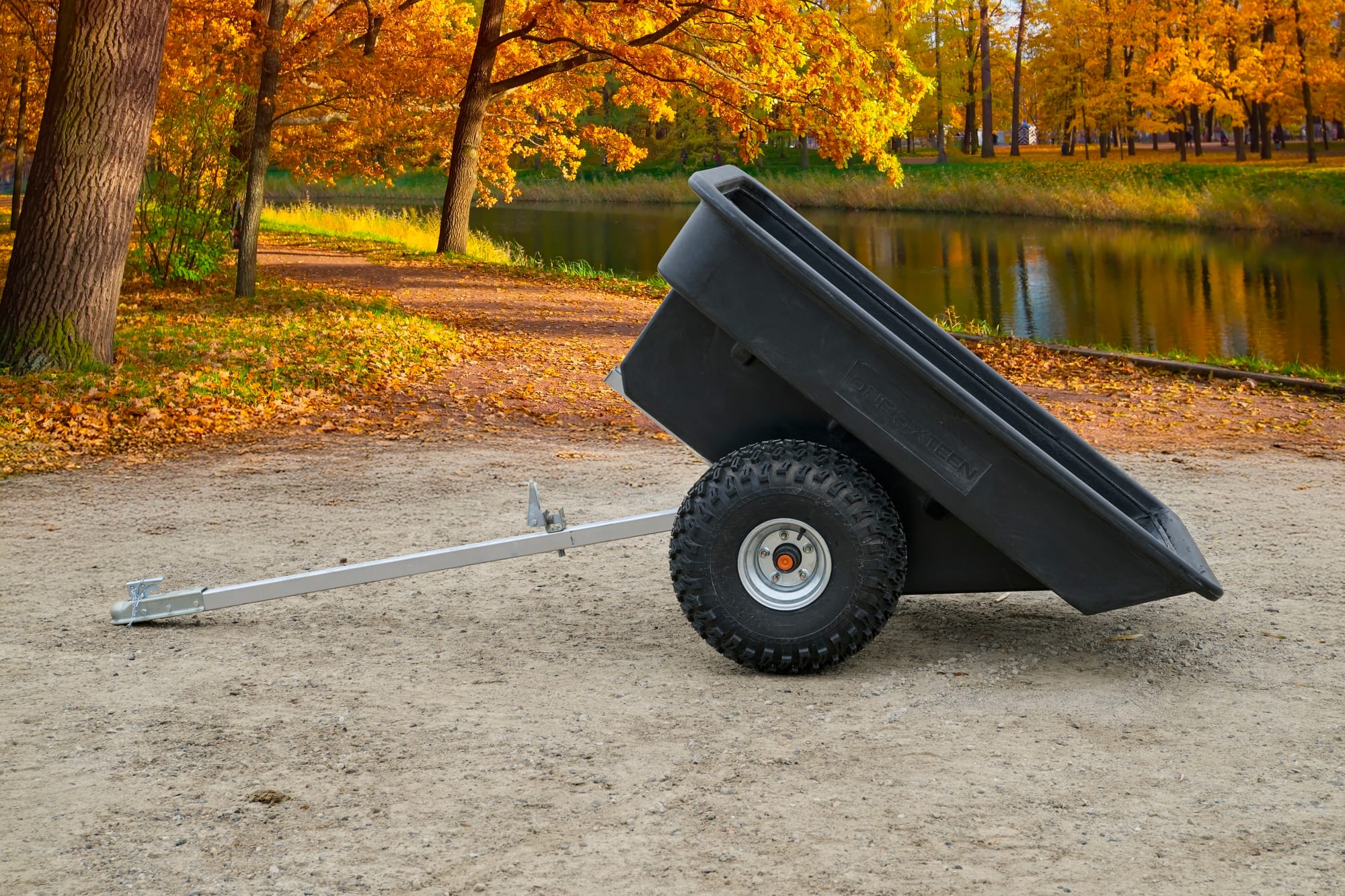 ATVCB ATV trailer black plastic tub, single rear wheel, full right side view with tow hitch